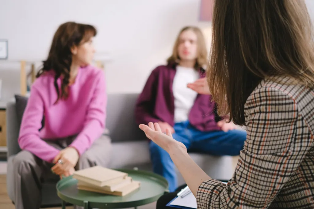 Supportive conversation between adults about mental health